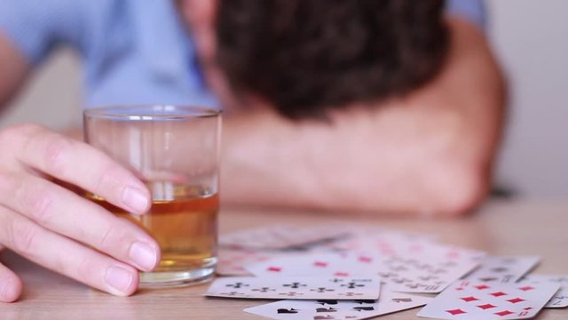 Drinking whisky and playing cards