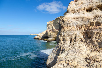 Fototapeta na wymiar View of sandstone cliffs near Carvoeiro in Portugal
