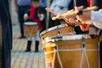 Group of Men Dressed in Medieval Clothes Playing Drums