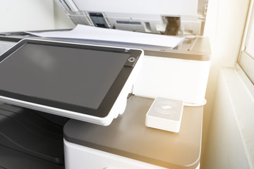 copying paper from Photocopier with access control for scanning key card and NFC technology