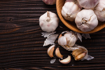 fragrant garlic on a wooden rustic background