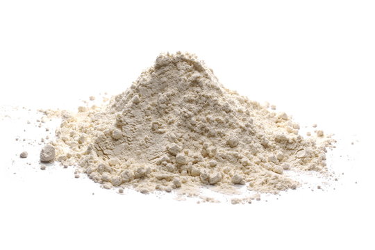 Wheat flour pile isolated on white background