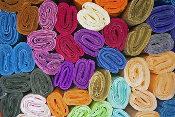 texture bright colorful paper coiled into rolls
