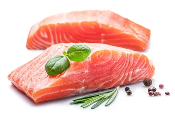 Foto op Canvas Fresh raw salmon fillets with herbs and spices. © volff