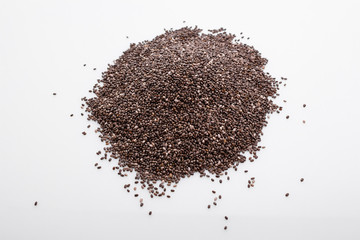 chia seeds on a white acrylic background