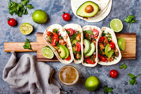 Mexican Grilled Chicken Tacos With Avocado, Tomato, Onion On Rustic Stone Table. Recipe For Cinco De Mayo Party. Top View, Overhead, Flat Lay.