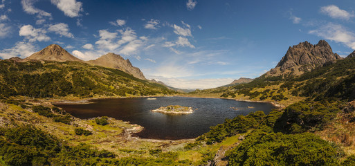 View on the lake and mountains around on the southernmost trek in the world in Dientes de Navarino...