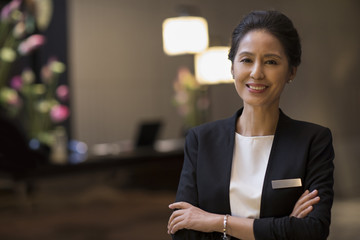 Portrait of confident hotel manager