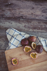 Passion Fruits On Wooden Background