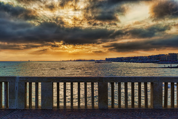 Beautiful colorful sunset on the sea of Rome in Lido di Ostia - Italy