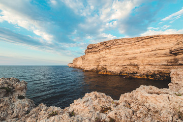 Clear sky over a blue sea by the beach  Cliffs background