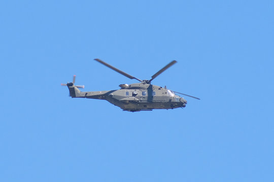 The image of helicopter in the sky