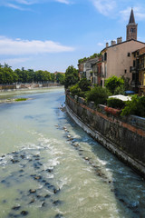 Verona, Italy - July, 15, 2018: embankment of Adige river in Verona, Italy