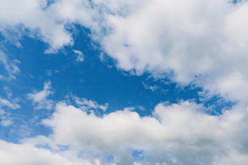 Blue sky background with clouds.