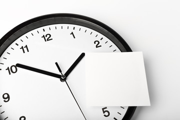 paper stick on clock for notice something with white background