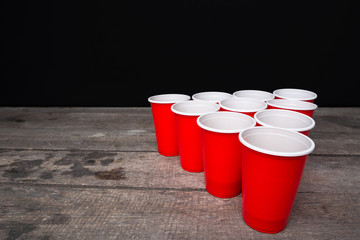 Game Beer Pong on wooden table