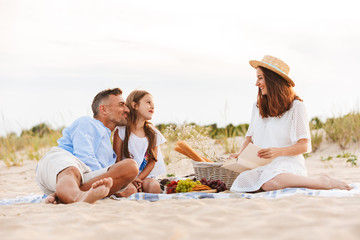 Cheerful family with father, mother, daughter