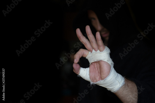 Hand Of Pro Boxer With Bandage On The Fists Before Fight