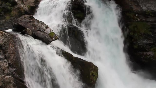 Falls in mountains. Geiranger, Stranda, Norway