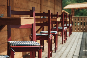 sunlight and table and chairs in modern balcony