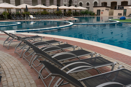 Sun beds at the edge of the pool