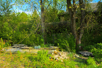 Old abandoned iron rusty tanks and metal structures. The crisis, the collapse of the economy, the cessation of production capacity, led to a collapse. The global catastrophe.