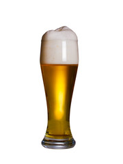 Glass of beer with cap of foam. Glass of ale isolated on white background