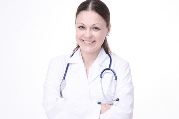 Portrait of young happy female doctor with crossed hands