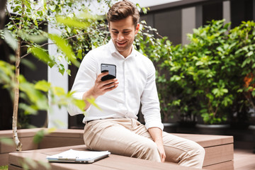 Smiling young male manager