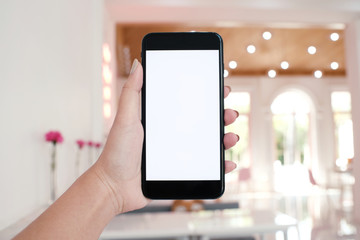 Women hands holding cell telephone blank copy space screen. smart phone with technology concept