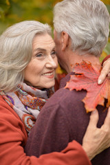 Portrait of a happy senior couple hugging