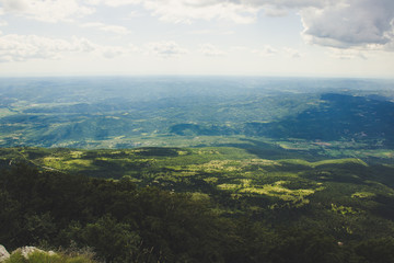 world earth concept of soft focus colorful big valley nature scenery landscape with horizon lane from above 