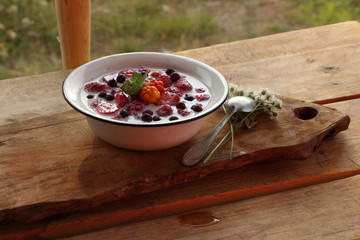 breakfast in the village berries with milk