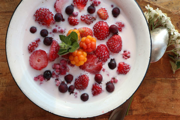 breakfast in the village berries with milk and mint