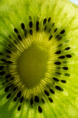 Kiwi fruit texture background with selective focus and crop fragment