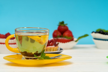 Cup of fresh lemon tea with mint