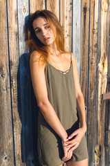 Fototapeta premium Girl in a light dress on the straps, sexy grunge girl sensually 