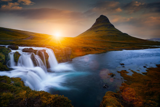Beautiful waterfall landscape at Kirkjufell mountain, Snaefellsnes peninsula, Iceland © pakorn482137