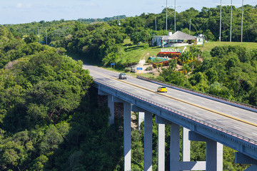 The Bridge of Bacunayagua crosses the canyon, and at 110 meters above the valley floor is the highest bridge in Cuba and is the road from Havana to the Matanzas Province.
