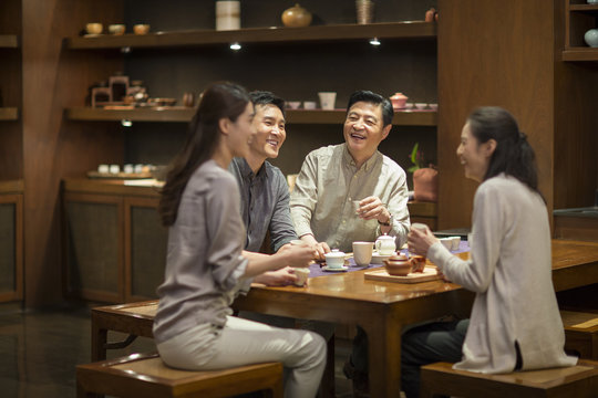 Friends drinking tea together