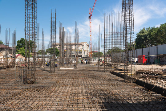 construction of a new building, concrete frame and reinforcement with crane, general view