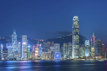 Panorama of Victoria Harbor of Hong Kong city at dusk