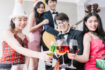 Teenagers are celebrating Christmas and New Year's Eve with cocktails.New Year celebration