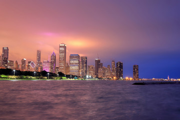 Chicago, Illinois, USA - June 22, 2018 - The Chicago skyline at night after a storm across Lake...