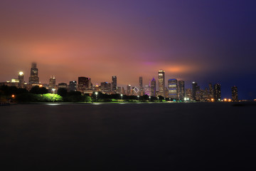 Obraz premium Chicago, Illinois, USA - June 22, 2018 - The Chicago skyline at night after a storm across Lake Michigan.