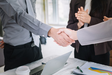 Businessmen shake hands after meeting.Business etiquette to congratulate mergers and acquisitions.