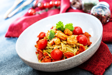 Small prawns tomato compote Tagliatelle with pesto