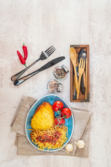Escalope of spaghetti with tomatoes sauce and basil
