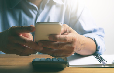 Businessman using smartphone and enjoy with concept is for business,social network on white background.