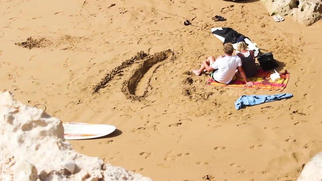 Couple Hanging Out on the Beach in Morocco